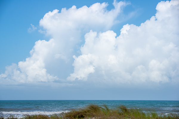 Beach;Blue;Cloud;Cloud Formation;Clouds;Cloudy;Florida;Grasses;Ocean;Sea;Sea Oats;Seascape;Waterscape;Waves;beach;beaches;coast;coastline;green;plants;sea;shore;shoreline;sky